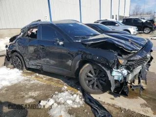 2024 Mazda CX-50 S Premium with VIN 7MMVABDMXRN195875, listed as a Copart auction lot 88483835 with Not provided miles and Salvage title. Bid and sale history available at DreamBid. Image 4.