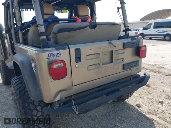2005 Jeep Wrangler SE with VIN 1J4FA29S25P328827, listed as a IAAI auction lot 41917807 with 157,562 mi miles. Bid and sale history available at carsss.com. Image 6.