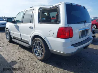 2004 Lincoln Navigator Luxury with VIN 5LMFU28R84LJ27797, listed as a IAAI auction lot 41101230 with 148,716 mi miles. Bid and sale history available at carsss.com. Image 3.