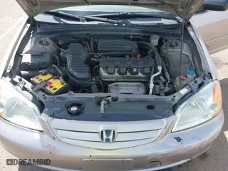 2001 Honda Civic LX with VIN 2HGES16511H554168, listed as a IAAI auction lot 42009621 with 163,801 mi miles. Bid and sale history available at carsss.com. Image 10.
