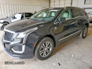 2022 Cadillac XT5 FWD Premium Luxury with VIN 1GYKNCRS1NZ166363, listed as a Copart auction lot 62932735 with 25,104 mi miles and Salvage title. Bid and sale history available at DreamBid. Image 1.