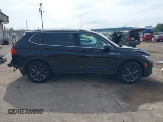2023 Volkswagen Tiguan SE with VIN 3VVMB7AXXPM003447, listed as a IAAI auction lot 42566061 with 39,185 mi miles and . Bid and sale history available at DreamBid. Image 13.