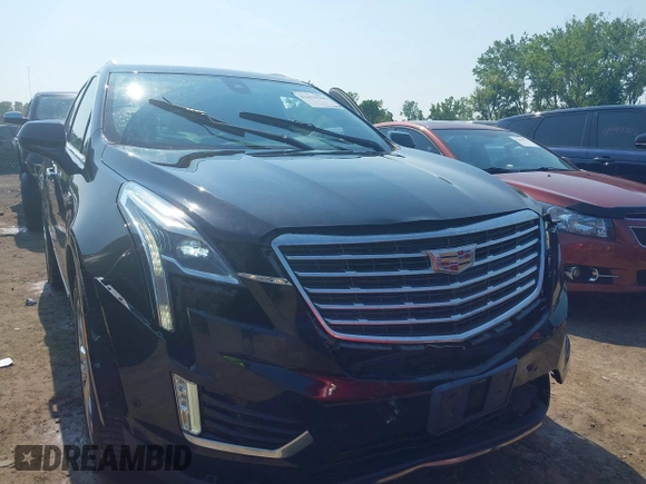2017 Cadillac XT5 Platinum AWD with VIN 1GYKNFRS6HZ130626, listed as a IAAI auction lot 42470536 with 128,129 mi miles and . Bid and sale history available at DreamBid. Image 6.