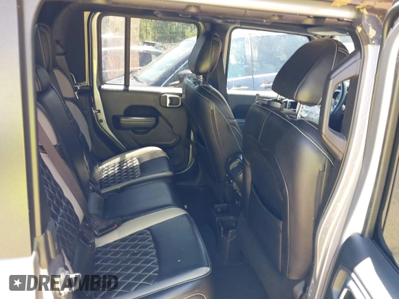 2021 Jeep Gladiator Willys z VIN 1C6HJTAG6ML507039, wystawiony jako IAAI lot #42057637 z przebiegiem 69 443 mil mil oraz . Historia ofert i sprzedaży dostępna na DreamBid. Obrazek 8.