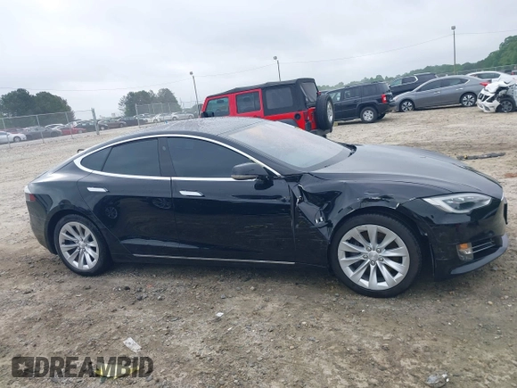 2017 Tesla Model S 60 with VIN 5YJSA1E1XHF232745, listed as a IAAI auction lot 41986834 with 89,581 mi miles and . Bid and sale history available at DreamBid. Image 13.
