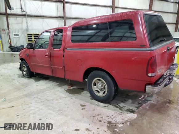 2000 Ford F-150 XL with VIN 1FTRX17W3YNC12019, listed as a Copart auction lot 41402325 with 182,123 mi miles and Salvage Title. Bid and sale history available at carsss.com. Image 2.