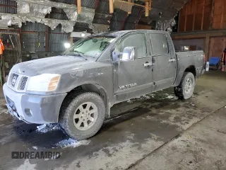 2005 Nissan Titan LE with VIN 1N6AA07B45N524574, listed as a Copart auction lot 87091104 with 158,969 mi miles and Clean Title. Bid and sale history available at carsss.com. Image 1.