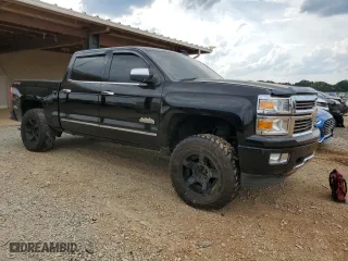 2015 Chevrolet Silverado 1500 High Country with VIN 3GCUKTEJXFG536182, listed as a Copart auction lot 72272584 with 143,071 mi miles and Salvage Title. Bid and sale history available at carsss.com. Image 4.