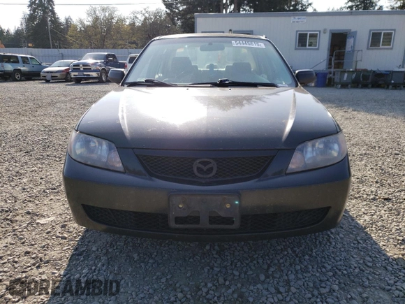 2003 Mazda Protege DX with VIN JM1BJ226231214537, listed as a Copart auction lot 54448615 with 147,753 mi miles and Salvage Title. Bid and sale history available at DreamBid. Image 5.