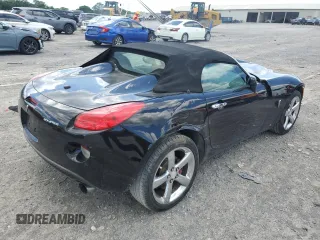 2006 Pontiac Solstice z VIN 1G2MB35B76Y113840, wystawiony jako Copart lot #58294374 z przebiegiem 83 511 mil mil oraz Szkoda całkowita • Salvage title. Historia ofert i sprzedaży dostępna na DreamBid. Obrazek 3.