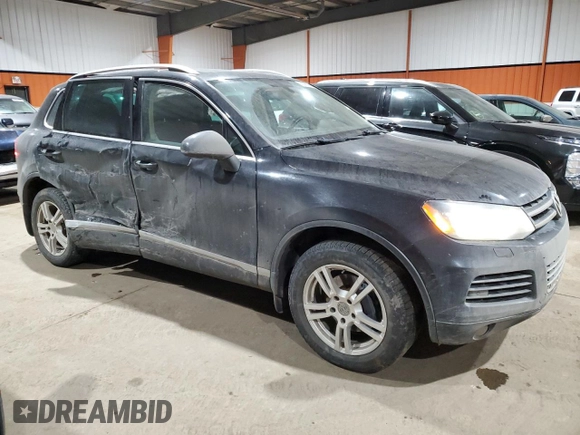 2013 Volkswagen Touareg Sport с VIN WVGEP9BP5DD008301, выставлен на аукционе Copart как лот 85085984 с пробегом 204 735 миль миль и Списание • Salvage title. История ставок и продаж доступна на DreamBid. Изображение 4.