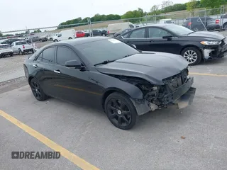 2014 Cadillac ATS Luxury AWD with VIN 1G6AH5RX4E0187053, listed as a IAAI auction lot 42364491 with 122,199 mi miles and . Bid and sale history available at DreamBid. Image 1.