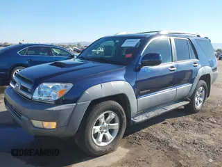 2003 Toyota 4Runner SR5 with VIN JTEZT14R238001097, listed as a IAAI auction lot 41266011 with 180,905 mi miles. Bid and sale history available at carsss.com. Image 2.
