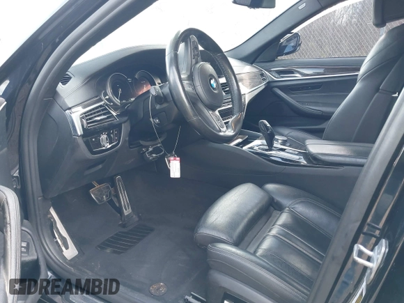 2018 BMW 5 Series 530i with VIN WBAJA5C50JWA35707, listed as a IAAI auction lot 41722656 with 137,619 mi miles and . Bid and sale history available at DreamBid. Image 5.