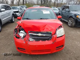 2008 Chevrolet Aveo LS with VIN KL1TD56618B052786, listed as a IAAI auction lot 40890445 with 164,714 mi miles and . Bid and sale history available at DreamBid. Image 12.