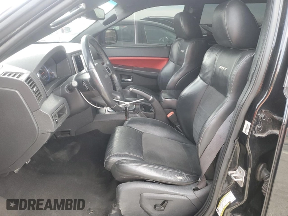 2008 Jeep Grand Cherokee SRT-8 with VIN 1J8HR78398C214004, listed as a Copart auction lot 48760375 with 165,318 mi miles and Salvage Title. Bid and sale history available at carsss.com. Image 7.