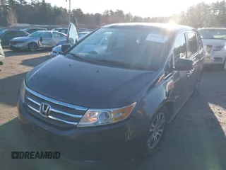 2013 Honda Odyssey EX-L with VIN 5FNRL5H64DB034860, listed as a IAAI auction lot 42013204 with 104,314 mi miles and . Bid and sale history available at carsss.com. Image 17.