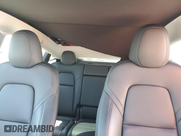 2024 Tesla Model Y Long Range with VIN 7SAYGAEE0RF016323, listed as a Copart auction lot 50253205 with 12,490 mi miles and Salvage title. Bid and sale history available at DreamBid. Image 10.
