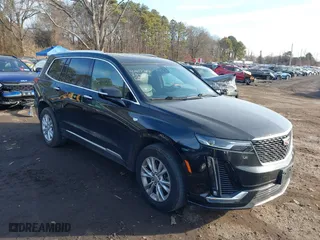 2023 Cadillac XT6 Luxury with VIN 1GYKPBR41PZ136918, listed as a IAAI auction lot 41417724 with 57,949 mi miles. Bid and sale history available at carsss.com. Image 13.