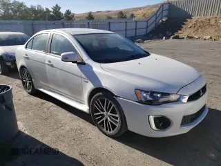 2017 Mitsubishi Lancer ES with VIN JA32V2FW6HU014960, listed as a Copart auction lot 70043804 with 102,710 mi miles and Salvage Title. Bid and sale history available at carsss.com. Image 4.