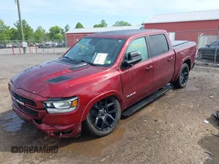 2022 Ram 1500 Laramie z VIN 1C6SRFJT0NN333200, wystawiony jako IAAI lot #42217219 z przebiegiem 27 332 mil mil oraz . Historia ofert i sprzedaży dostępna na DreamBid. Obrazek 2.