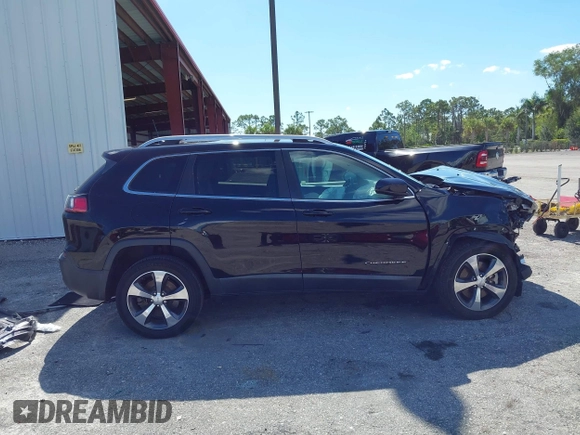 2019 Jeep Cherokee Limited z VIN 1C4PJLDX5KD487535, wystawiony jako IAAI lot #42263873 z przebiegiem 51 345 mil mil oraz . Historia ofert i sprzedaży dostępna na DreamBid. Obrazek 13.