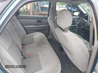 2006 Ford Taurus SE with VIN 1FAHP53226A245951, listed as a IAAI auction lot 42389703 with Not provided miles and . Bid and sale history available at DreamBid. Image 8.