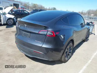 2024 Tesla Model Y Performance with VIN 7SAYGDEF1RA329825, listed as a IAAI auction lot 41762602 with 3,923 mi miles and . Bid and sale history available at DreamBid. Image 4.
