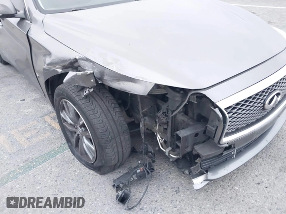 2015 Infiniti Q50 Premium with VIN JN1BV7AP6FM357265, listed as a IAAI auction lot 42104440 with 83,404 mi miles. Bid and sale history available at carsss.com. Image 6.