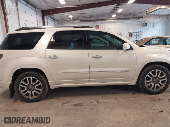 2014 GMC Acadia Denali with VIN 1GKKVTKD1EJ351419, listed as a IAAI auction lot 41728881 with 245,672 mi miles and . Bid and sale history available at carsss.com. Image 14.