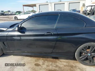 2014 BMW 4 Series 435i with VIN WBA3T3C59EP737612, listed as a IAAI auction lot 42260394 with 104,877 mi miles and . Bid and sale history available at DreamBid. Image 14.
