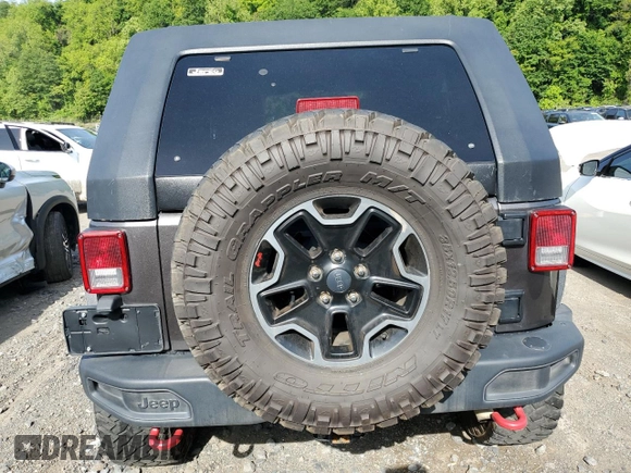 2016 Jeep Wrangler Unlimited Rubicon with VIN 1C4BJWFG4GL252209, listed as a Copart auction lot 58525725 with 46,604 mi miles and Salvage title. Bid and sale history available at DreamBid. Image 6.