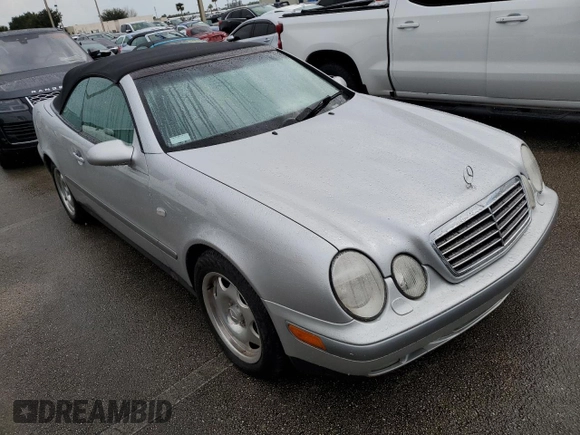 1999 Mercedes-Benz CLK 320/430 z VIN WDBLK65GXXT023566, wystawiony jako Copart lot #73857834 z przebiegiem Nie podano mil oraz Szkoda całkowita • Salvage title. Historia ofert i sprzedaży dostępna na DreamBid. Obrazek 4.