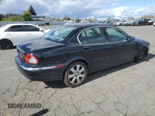 2004 Jaguar X-Type with VIN SAJEA51C74WD56736, listed as a Copart auction lot 48038295 with 115,817 mi miles and Salvage Title. Bid and sale history available at DreamBid. Image 3.