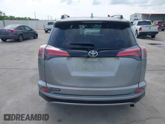 2018 Toyota RAV4 SE with VIN 2T3NFREV9JW424156, listed as a IAAI auction lot 42110768 with 80,376 mi miles and . Bid and sale history available at DreamBid. Image 16.