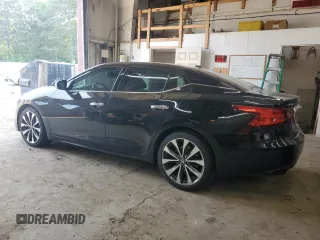 2017 Nissan Maxima SV z VIN 1N4AA6AP0HC402892, wystawiony jako Copart lot #58530165 z przebiegiem 100 628 mil mil oraz Szkoda całkowita • Salvage title. Historia ofert i sprzedaży dostępna na DreamBid. Obrazek 2.