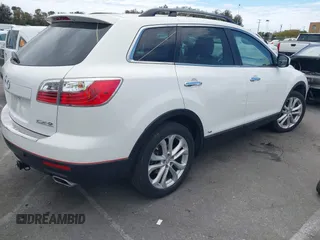 2012 Mazda CX-9 Grand Touring with VIN JM3TB2DV1C0365341, listed as a IAAI auction lot 42034276 with 141,725 mi miles and . Bid and sale history available at DreamBid. Image 4.