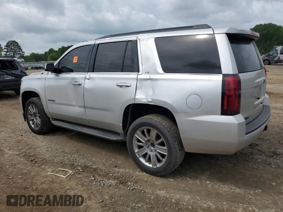 2016 Chevrolet Tahoe LS with VIN 1GNSCAKC7GR292272, listed as a Copart auction lot 54091975 with 221,137 mi miles and Salvage title. Bid and sale history available at DreamBid. Image 2.
