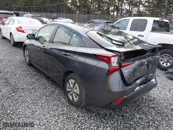 2021 Toyota Prius L Eco with VIN JTDKAMFU2M3143138, listed as a IAAI auction lot 41658263 with 102,718 mi miles. Bid and sale history available at carsss.com. Image 3.