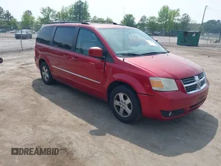 2010 Dodge Grand Caravan SXT with VIN 2D4RN5D17AR145958, listed as a IAAI auction lot 42125450 with 229,790 mi miles and . Bid and sale history available at DreamBid. Image 1.
