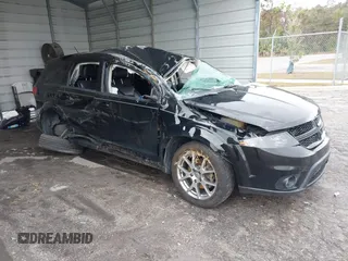 2015 Dodge Journey R/T with VIN 3C4PDDEG3FT555035, listed as a IAAI auction lot 41067936 with 214,244 mi miles and . Bid and sale history available at DreamBid. Image 1.