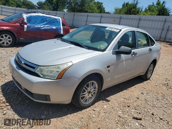 2008 Ford Focus SE z VIN 1FAHP35N78W115746, wystawiony jako Copart lot #60981575 z przebiegiem 195 035 mil mil oraz Czysty tytuł • Clean title. Historia ofert i sprzedaży dostępna na DreamBid. Obrazek 1.