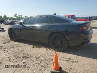 2015 Dodge Charger SXT with VIN 2C3CDXHGXFH896327, listed as a Copart auction lot 55931805 with 204,345 mi miles and Salvage Title. Bid and sale history available at DreamBid. Image 2.