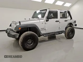 2012 Jeep Wrangler Unlimited Sport z VIN 1C4BJWDG3CL262310, wystawiony jako Copart lot #57663875 z przebiegiem 171 477 mil mil oraz Czysty tytuł • Clean title. Historia ofert i sprzedaży dostępna na DreamBid. Obrazek 1.