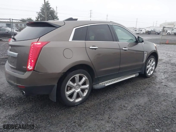 2014 Cadillac SRX Performance Collection with VIN 3GYFNCE30ES635570, listed as a IAAI auction lot 41084932 with 85,298 mi miles. Bid and sale history available at carsss.com. Image 4.