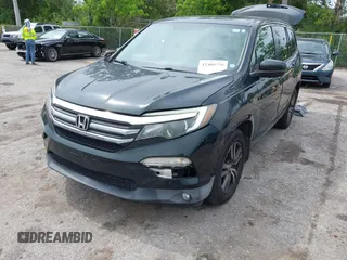 2017 Honda Pilot EX-L with VIN 5FNYF6H50HB033968, listed as a IAAI auction lot 42400720 with 119,597 mi miles and . Bid and sale history available at DreamBid. Image 6.