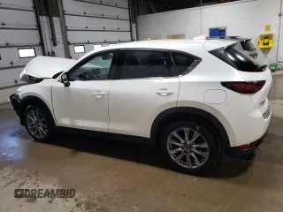 2020 Mazda CX-5 Grand Touring with VIN JM3KFBDM5L1851734, listed as a Copart auction lot 56729585 with 39,023 mi miles and Salvage title. Bid and sale history available at DreamBid. Image 2.