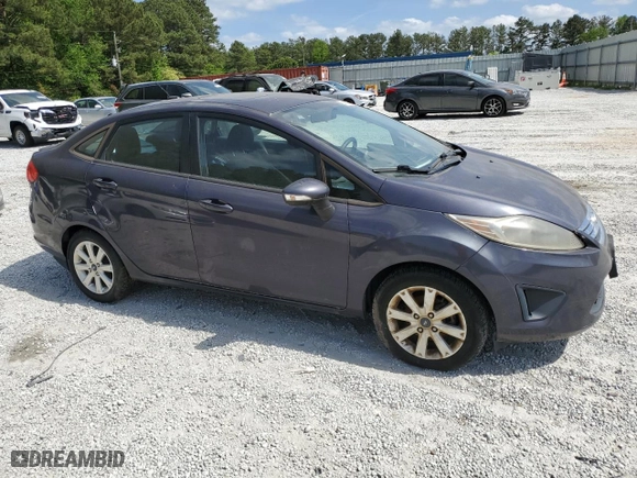 2013 Ford Fiesta SE with VIN 3FADP4BJ6DM110909, listed as a Copart auction lot 54047945 with 124,519 mi miles and Clean Title. Bid and sale history available at carsss.com. Image 4.
