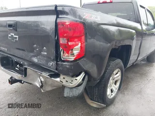 2014 Chevrolet Silverado 1500 LT with VIN 1GCVKREC0EZ181238, listed as a IAAI auction lot 42155213 with 171,893 mi miles and . Bid and sale history available at DreamBid. Image 6.
