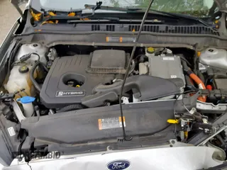 2016 Ford Fusion SE Hybrid with VIN 3FA6P0LUXGR397589, listed as a Copart auction lot 58180612 with 72,400 mi miles and Salvage Title. Bid and sale history available at carsss.com. Image 7.